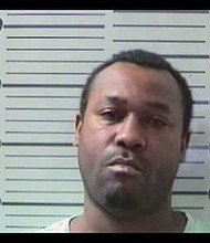 Bond was set just short of $1.1 million for Robert Hooper, who is accused of shooting into a car while driving on I-10, wounding his own 9-year-old daughter.