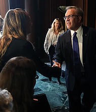 Environmental Protection Agency chief Andrew Wheeler did not voice alarm Wednesday about the dire predictions in the government's recent climate report, and instead said the Trump administration deserves credit for a decline in carbon emissions in his first remarks since the government released a devastating report Friday on the growing impacts of climate change.