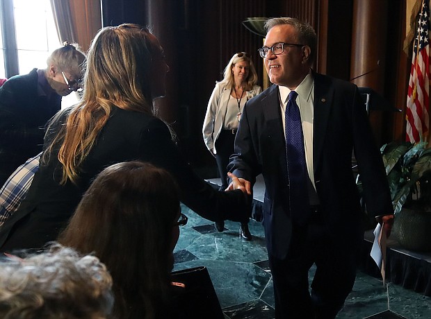 Environmental Protection Agency chief Andrew Wheeler did not voice alarm Wednesday about the dire predictions in the government's recent climate report, and instead said the Trump administration deserves credit for a decline in carbon emissions in his first remarks since the government released a devastating report Friday on the growing impacts of climate change.