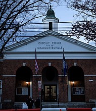 Reporters wait for live shots during the first day of jury selection for James Fields Jr.'s murder trial at the Charlottesville Circuit Court, Monday in Charlottesville, Virginia.
