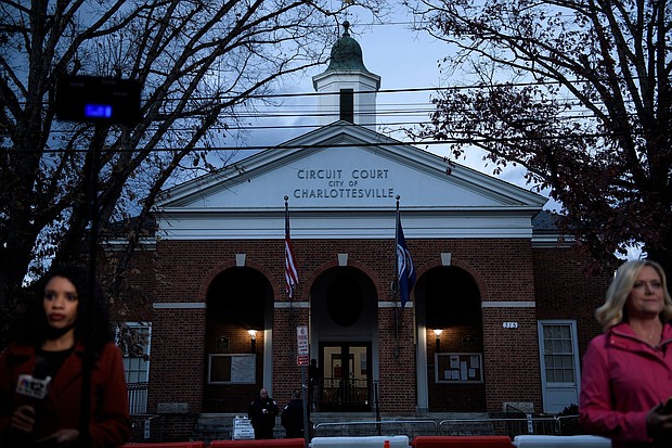 Reporters wait for live shots during the first day of jury selection for James Fields Jr.'s murder trial at the Charlottesville Circuit Court, Monday in Charlottesville, Virginia.