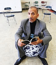 Dr. Ram Bhagat sits in the Restorative Practices Room at Martin Luther King Jr. Middle School that will be used for in-school suspension students to work with trained staff to better handle conflicts.