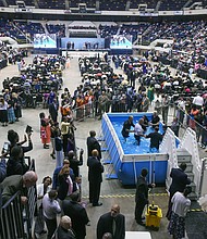 The Richmond Coliseum is packed for a baptism ceremony during a Jehovah’s Witness Convention in July 2015. The denomination’s annual conventions drew thousands of people for several consecutive weekends each summer to the Downtown venue until they were moved this year to the Greater Richmond Convention Center.