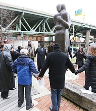 Brother’s and sister’s keepers: Nearly two dozen people attend the “I Am My Brother’s and Sister’s Keeper” Day program last Friday at the Reconciliation Statue at 15th and Main streets by Shockoe Bottom. Organized by Richmond Delegate Delores L. McQuinn, the event sought healing, cooperation, love, peace and an end to violence and racism in the community. Political, community and faith leaders attended the event, including Delegate Eileen Filler-Corn of Fairfax County. Following the speeches, the group walked to the Virginia Holocaust Museum on East Cary Street for lunch and a panel discussion. (Regina H. Boone/Richmond Free Press)