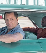 World-class pianist Donald W. “Don” Shirley, right, played by actor Mahershala Ali, sets out on a 1962 concert tour from Manhattan to the Deep South with driver Frank A. “Tony Lip” Vallelonga, a New York club bouncer, played by actor Viggo Mortensen.