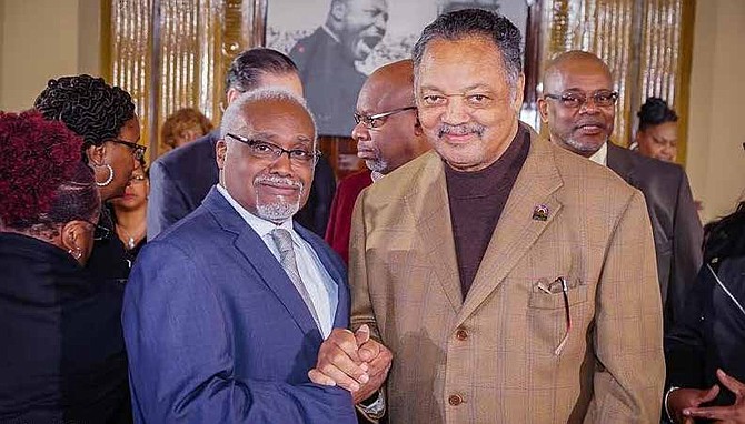 The Mayor of the Village of Robbins, Tyrone Ward (left), pictured with Rev. Jesse Jackson at the recent Robbins Day celebration. Photo Credit: Rainbow/PUSH.