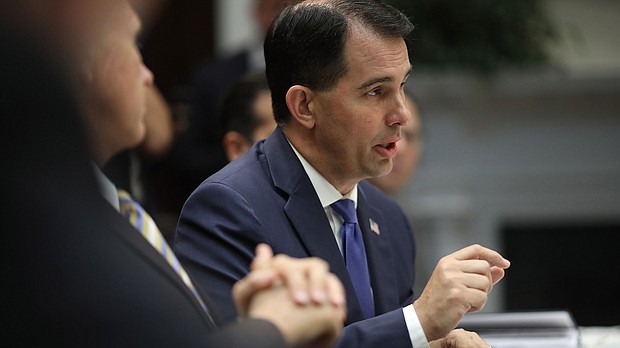 Wisconsin Governor Scott Walker speaks during a working lunch with U.S. President Donald Trump and U.S. governors at the White House June 21, 2018 in Washington, DC.