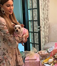 Baguette Gonzalez celebrated her birthday with some high fashion, a money gun, a lavish spread and a birthday cake made to look like she devoured said cake.