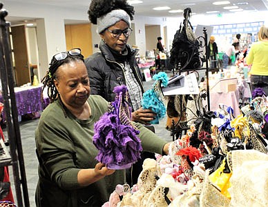 Ruth Taylor (Angels for You), left, showing customer Emma Sembly-Brodie her hand-crafted angels