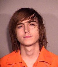 18-year-old Hayden Samuel Umdenstock has been arrested and charged with 1st Degree Murder in the death of his father, 42-year-old Zachary Umdenstock.