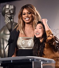 Laverne Cox (L) and Awkwafina speak onstage during the 25th Annual Screen Actors Guild Awards Nominations Announcement at Pacific Design Center on December 12, 2018 in West Hollywood, California.

Full credit: Alberto E. Rodriguez/Getty Images
