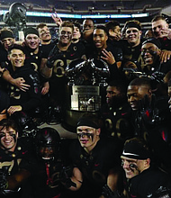 The Army Black Knights celebrate their 17-10 win last Saturday over the Navy Midshipmen.