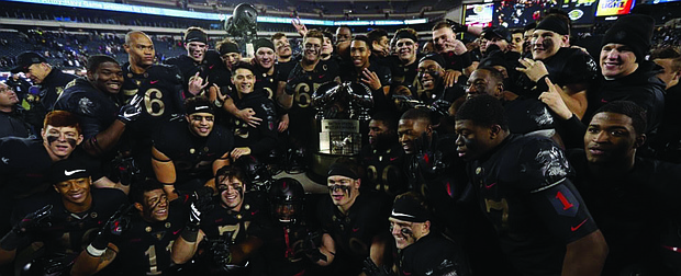 The Army Black Knights celebrate their 17-10 win last Saturday over the Navy Midshipmen.