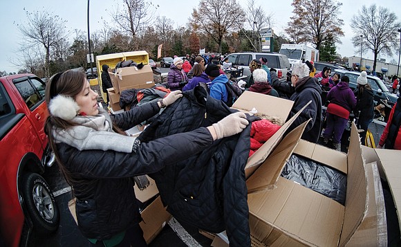 Several hundred new winter coats were distributed to people of all ages last week by two different organizations, just in ...