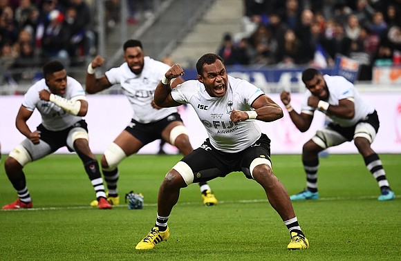Under the lights of a quickly-emptying Stade de France, Fiji's rugby players came together for a huddle, a hymn, and …
