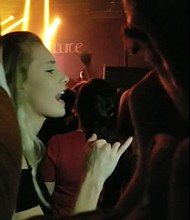 A viral video shows Kari Carberry signing the lyrics of songs for her deaf father, Darrin Carberry, at a Three Days Grace concert in Canada.