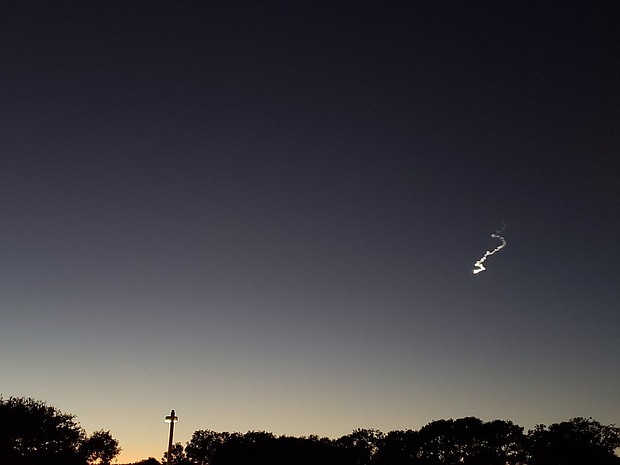 A bright, strange-looking light streaked across Northern California Wednesday night, its appearance coinciding with a scrapped rocket launch and leaving the Twitterverse asking, "So, what's that in the sky?"