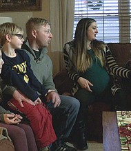 Rutherfordton Army National Guardsman Brandon Whiteside, who was in Iraq for about nine months, was wrapped as a present to surprise his kids.