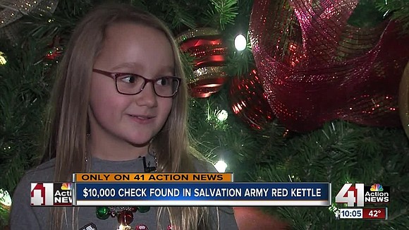 The Salvation Army is celebrating a big gift after a mysterious donor dropped a check for $10,000 in a Red …