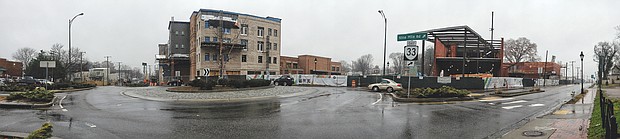 After more than a year of construction, a residential and retail complex is taking shape in Church Hill in the block bounded by Nine Mile Road, Fairmount Avenue and 25th, 24th and Redd streets. Looking north from S Street, the complex’s largest element is the new apartment buildings, at left, with 42 units that face Fairmount Avenue. At the center, just beyond a barricade blocking entry to 25th Street is the building that will house the new grocery store, the Market at 25th. At right, the steel skeleton of the J. Sargeant Reynolds Culinary School is going up adjacent to Nine Mile Road. The city has contributed $500,000 to support the development Steven and Kathie Markel are undertaking with other partners, including J. Sargeant Reynolds Community College. The site is just a few blocks west of the Church Hill North development that is bringing new apartments and homes to the property that once housed Armstrong High School at Nine Mile Road and 31st Street. (Sandra Sellars/Richmond Free Press)
