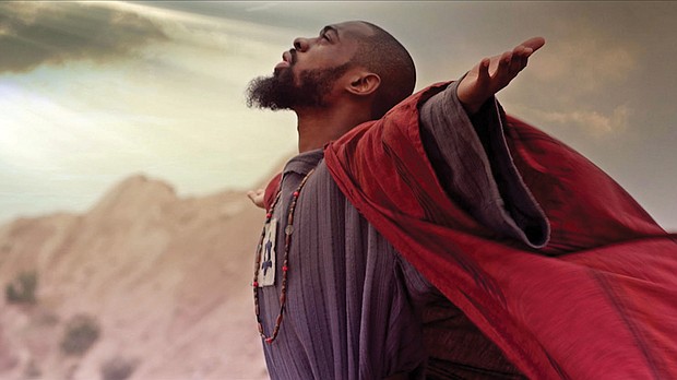 Mali Music as Jesus in a scene from the new film “Revival!”