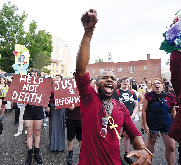 Hip-hop musician J. Roddy Rod joins a crowd of more than 300 people at a June rally and march protesting the shooting death of Marcus-David Peters, 24, by a Richmond Police officer.