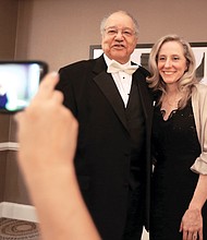 Dr. Clinton V. Turner, former Virginia secretary of agriculture and consumer services, poses for a photograph with Congresswoman-elect Abigail Spanberger of Henrico County during the reception at the Richmond Continentals’ “Elegance in Black & White” fundraising gala.