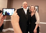 Dr. Clinton V. Turner, former Virginia secretary of agriculture and consumer services, poses for a photograph with Congresswoman-elect Abigail Spanberger of Henrico County during the reception at the Richmond Continentals’ “Elegance in Black & White” fundraising gala.