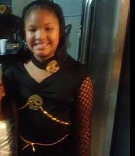 When she heard the pop of gunfire, LaPorsha Washington said she threw her body over her eldest daughter in the front seat, shielding her during a Sunday morning coffee run with her children.