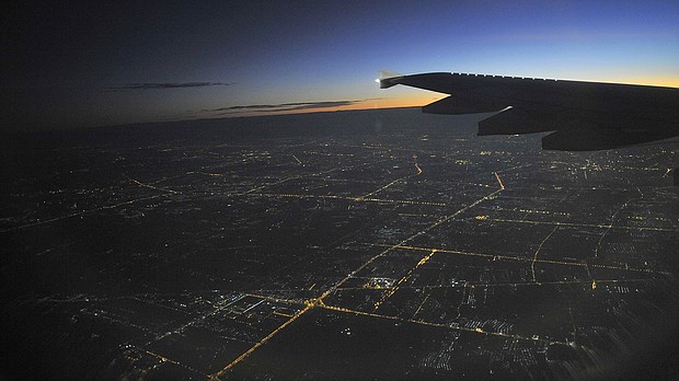 A young Saudi woman says she is being detained at Bangkok's main airport after trying to escape from her parents in Kuwait.