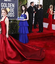 Glenn Close may have snagged the Golden Globe for best actress in a drama movie and Christian Bale won for best actor in a comedy. But when it came to stealing the show, it was all about a mysterious brunette who you have almost certainly never heard of.