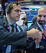 The Dow jumped another 200 points, or 0.8%, on Monday. That follows Friday's 747-point spike.