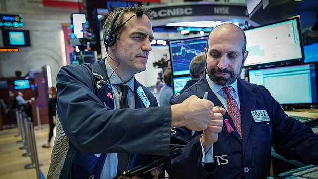 The Dow jumped another 200 points, or 0.8%, on Monday. That follows Friday's 747-point spike.
