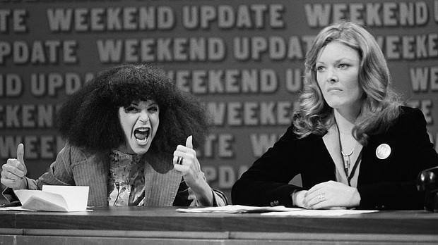 Gilda Radner, left, as Roseanne Roseannadanna, with Jane Curtin during "SNL's" "Weekend Update."