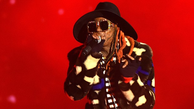 Forget the game. Let's discuss Lil Wayne's outfit during the College Football Playoff National Championship halftime show.