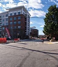 New apartments are taking shape on the hilltop in Fulton in the city’s East End. This photo offers a view of the $40 million development on the former Fulton Elementary School property that, until recently, had been used for artists’ studios. (Sandra Sellars/Richmond Free Press)