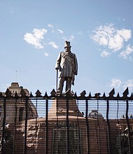 A statue of the late Paul Kruger, president of the South African Republic from 1883 to 1900, remains a flashpoint as a testament to that nation’s racist past of apartheid and stirs deep divisions over whether it should remain or be scrapped.