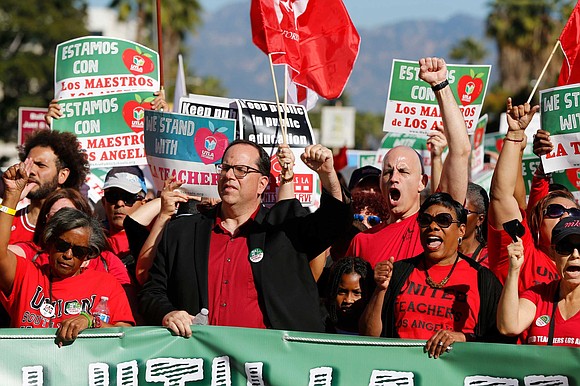 Under a relentless drizzle of cold rain, 32,000 Los Angeles educators walked off the job Monday in the country's second-biggest …