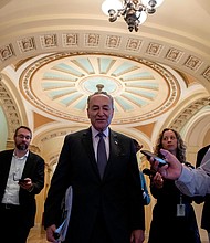 In a rebuke to the Trump administration on Russia, Senate Democrats and at least 10 Republicans voted to advance a measure Tuesday that would stop the Treasury Department from relaxing sanctions on three Russian companies with ties to oligarch Oleg Deripaska, a Kremlin ally.