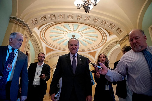 In a rebuke to the Trump administration on Russia, Senate Democrats and at least 10 Republicans voted to advance a measure Tuesday that would stop the Treasury Department from relaxing sanctions on three Russian companies with ties to oligarch Oleg Deripaska, a Kremlin ally.