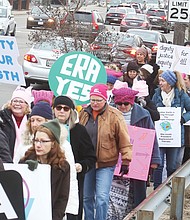 Hundreds of participants calling for equal rights walk the 2-mile loop from the Arthur Ashe Jr. Athletic Center on the Boulevard to Broad Street during last Saturday’s Women’s March RVA.