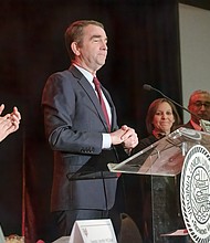 Gov. Ralph S. Northam urges people to follow Dr. Martin Luther King Jr.’s lead and become vocal “about things that matter” at the annual Community Leaders Breakfast last Friday celebrating the civil rights icon. Left, Richmond state Sen. Jennifer L. McClellan joins in applauding the governor after introducing him.