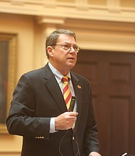 Lt. Gov. Justin E. Fairfax takes a seat in the Senate chamber last Friday rather than preside at the dais when Republican state Sen. Richard H. Stuart of King George County, above, asks that the body adjourn for the day in honor of Confederate Gen. Robert E. Lee.