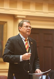 Lt. Gov. Justin E. Fairfax takes a seat in the Senate chamber last Friday rather than preside at the dais when Republican state Sen. Richard H. Stuart of King George County, above, asks that the body adjourn for the day in honor of Confederate Gen. Robert E. Lee.