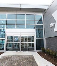 A new sign adorns the exterior of the Northside Family YMCA on Old Brook Road. The facility has undergone a $5 million renovation, with the Royal Family Lounge, below, an example of the modern spaces for members to enjoy. The lounge is named for longtime Richmond physician Dr. Frank S. Royal and his family.