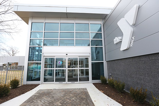 A new sign adorns the exterior of the Northside Family YMCA on Old Brook Road. The facility has undergone a $5 million renovation, with the Royal Family Lounge, below, an example of the modern spaces for members to enjoy. The lounge is named for longtime Richmond physician Dr. Frank S. Royal and his family.