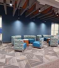 A new sign adorns the exterior of the Northside Family YMCA on Old Brook Road. The facility has undergone a $5 million renovation, with the Royal Family Lounge, below, an example of the modern spaces for members to enjoy. The lounge is named for longtime Richmond physician Dr. Frank S. Royal and his family.