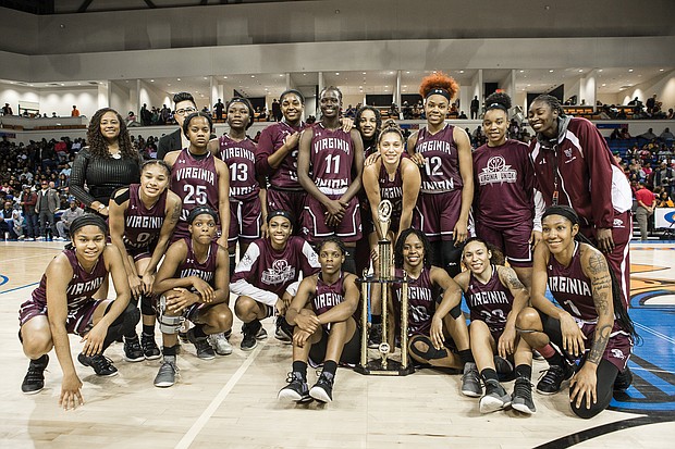 The VUU Lady Panthers pose with their Freedom Classic championship trophy after defeating VSU 73-49 last Saturday.