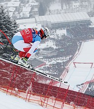Beat Feuz of Switzerland flies towards the finish of the Kitzbuhel downhill.

 **Credit: Christophe Pallot/Agence Zoom/Getty Images**