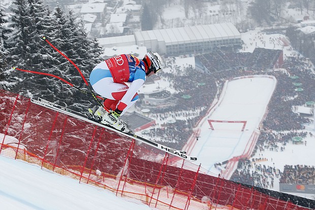 Beat Feuz of Switzerland flies towards the finish of the Kitzbuhel downhill.

 **Credit: Christophe Pallot/Agence Zoom/Getty Images**